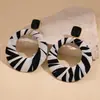 Pendientes Redondos Europeos y Americanos Transfronterizos Cortados con Patrón de Leopardo Lujo Accesible Pendientes de Gama Alta Moda Retro Pendientes Versátiles para Mujer
