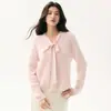 Nueva colección de otoño e invierno de ropa para mujer: suéteres de punto de cachemira con cuello en V y detalle de corbata, suéteres de color liso, tops sencillos y elegantes, versátiles y modernos