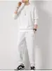 Conjunto deportivo de gofres transfronterizo Suelto Casual Otoño e Invierno Nuevo Cuello Redondo para Hombre Manga Larga Pantalones Ropa Juvenil