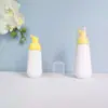 En stock botella cónica blanca de espuma de 60 ml, botella espumadora de PET para mousse de 100 ml, dispensador portátil de espuma facial