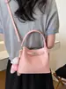 Bolsa de mão estilosa super popular transfronteiriça feminina 2026 novo estilo bolsa balde para trabalho e trajeto alto valor de aparência linda bolsa transversal