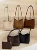 Bolso de Cubo Tejido Retro Transfronterizo para Mujer 2026 Otoño Nuevo Simple de Nicho para Viajar al Trabajo Bolso de Hombro Bajo el Brazo