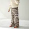 Pantalones para Niñas Primavera 2026 Estilo Nuevo Leggings Elegantes para Niños con Estampado de Corazones Pantalones Acampanados Casuales Versátiles