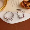 Amazon Moda Europeo y Americano Pendientes Asimétricos de Metal de Múltiples Capas Simples Aguja de Plata S925 Lujo Accesible Pendientes Exagerados Venta al por Mayor
