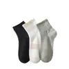 Calcetines Desechables para Hombres y Mujeres Tubo Largo Color Sólido Desodorantes Absorbentes de Sudor Transpirables Calcetines Deportivos de Baloncesto para Hombres Primavera y Otoño