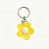 Suministra y Vende Clips para Sombrero de Crisantemo de Silicona, Clips para Gafas de Sol, Decoraciones Colgantes, Bolsas de Viaje, Equipaje, Accesorios de Bolsos de Moda