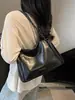 Bolsa Retro Elegante de Grande Capacidade para o Dia a Dia de Mulheres 2026 Nova Corrente Moda Bolsa Tote Simples Bolsa de Ombro