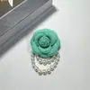 Broche de flor de camelia y perla estilo Chanel, pin de tela tridimensional, accesorio de alta gama, venta al por mayor