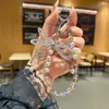 Celebridade da Internet Estéreo de Alta Qualidade Pingente de Corrente para Celular com Laço de Cristal Chaveiro Cordão de Celular com Pérola Corrente para Bolsa
