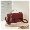 Bolsa Cuadrada Pequeña Portátil de Gama Alta al por Mayor para Mujer 2025 Nuevo Estilo Otoño Estilo Extranjero Bolso de Hombro con Empalme Bolso Cruzado para Viajeros