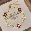 Nuevo Pulsera Versátil Estilo Chino para Mujer Sensación de Alta Gama Diseño de Cuerda Tejida a Mano de Zorro Circonita Cúbica Rosa Trébol de Cuatro Hojas Pulsera de Lujo Ligero