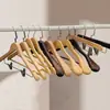 Cabide de madeira maciça antirroubo especial para hotel espessado antiderrapante suporte para roupas guarda-roupa com cabide para calças escova de sapato de seda clipes para secar roupas e calças
