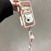 El cordón de doble soporte West Highland se transforma instantáneamente en una funda compatible con iPhone 16 Pro Max, diseño cielo estrellado de dopamina