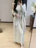 Conjunto de Xale com Franjas em Tricô Francês para Mulheres 2026 Nova Coleção Início da Primavera Elegante Slim Fit Suéter Saia Longa Conjunto de Duas Peças