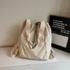 Mochila com Cordão Fashion Feminina 2026 Primavera Nova Simples de Mão Ombro Único Grande Capacidade Mochila de Viagem ao Ar Livre