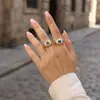 Atacado de joias Moda europeia e americana novo anel de resina olho de demônio olhos azuis vivo ajustável dieta anel de dedo