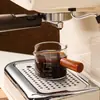 Mini jarra de leche con asa lateral y escala, hecha de vidrio de borosilicato de alta calidad, simple y engrosada, resistente a altas temperaturas, adecuada para uso doméstico