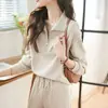 Conjunto Deportivo Dos Piezas Texturizado Casual Estilo Primavera y Otoño 2026 Sudadera Simple con Solapa Pantalones Largos de Cintura Elástica Traje para Mujer