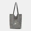 Nueva bolsa de lona de rayas de doble cara para mujer estilo coreano viento perezoso bolsa de mano de gran capacidad para clase y viaje bolsa de lona de mano
