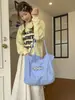 Bolso versátil transfronterizo 2026 verano nuevo de gran capacidad para hombro bolso de mano simple nicho bolsa de tela bolsa de compras
