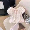 Camiseta Feminina Roupa de Verão 2026 Novo Estilo Coreano Manga Curta Menina Roupa de Verão Manga Bufante Doce Floral Top Roupa de Verão