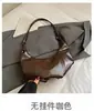 Bolso de axila de nicho estilo coreano, bolso tipo dumpling patchwork de moda vintage, bolso de gran capacidad para el día a día, bolso cruzado simple y elegante