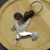 Chaveiro criativo masculino liga pássaro vintage tecido couro de vaca chaveiro bronze