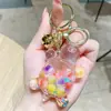 Explosivo Creativo Aceite Luminoso Tortuga Llavero Colgante para Bolso Máquina de Muñecos Caja Sorpresa Pequeño Regalo Colgante