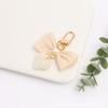 Nuevo Lazo Aleación Llavero Colgante Creativo Perla Hueco Amor Accesorios Cubierta de Audífonos Decoración de Bolso