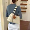 Bolso de mano simple de alta costura estilo coreano, bolso tipo cubo de nicho para el día a día, nuevo modelo 2026, bolso de hombro y axila elegante y versátil