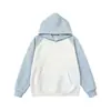 Sudadera estampada con patrón de estrellas y un elegante diseño otoño/invierno, con un look de patchwork estilizado y versátil, perfecta para parejas, y ofreciendo una estética de alta gama y nicho.