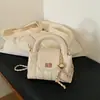 Moda Minimalista Transfronteiriça 2026 Nova Coleção Primavera/Verão Feminina Design de Nicho Exquisito Alta Qualidade Bolsa Quadrada Pequena de Ombro Cruzado
