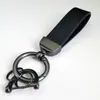 Chaveiro de Carro com Padrão de Fibra de Carbono Pingente Chaveiro com Logo de Carro em Couro PU Pequeno Presente Corporativo Chaveiro Venda por Atacado