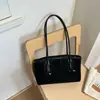 Bolso grande de alta moda retro estilo coreano para mujer, nuevo bolso de hombro casual para commuting 2026, bolso de mano tipo tote