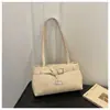 Bolsa feminina 2026 nova tendência única bolsa de ombro design de nicho estilo coreano debaixo do braço casual retrô bolsa de mão para o dia a dia