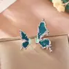 Brincos de Óleo Gota Azul Haze Borboleta Retrô Brincos Assimétricos Elegantes de Alto Padrão Design de Nicho Feminino Brincos de Moda