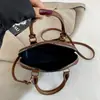 Otoño 2026 Nuevo Bolso de Mano Bolso Concha Estilo Retro Lujo Ligero Moda Tendencia Versátil Bolso de Hombro Cruzado Bolso para Mujer