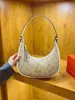 Bolso de mujer estilo vintage modelo nuevo 2026, versátil para el trabajo, bolso de hombro de media luna a la moda y casual, bolso de hombro popular con forma de cuerno