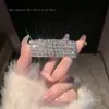 Pulsera abierta laminada elástica multicapa de circón de diamante completo y perla moda nicho ins simple lujo ligero pulsera avanzada