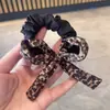 Laço de Fita Estampado de Leopardo Retro Tendência Elástico de Cabelo Rabo de Cavalo Baixo Corda de Cabelo Elegante Corda de Cabelo da Moda Flor de Cabelo Elástica Feminina