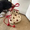 Popular bolsa de lona con cordón de lunares para mujer, nuevo modelo 2026, versátil bolso de hombro, bolso cruzado, bolso de mano, bolsa de la suerte de moda