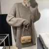 Estilo coreano estilo perezoso suave otoño e invierno Nuevo diseño de nicho tejido de punto top de color liso suéter de punto de longitud media para mujer