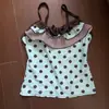 Conjunto de dos piezas de camisola sin mangas con lunares estilo INS de chocolate a la menta y lazo lindo, y falda de pastel