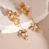 Pendientes de Metal Geométricos con Borlas Transfronterizos Estilo Europeo y Americano Lujo Ligero Pendientes Colgantes de Gama Alta Diseño Exagerado de Personalidad Pendientes de Nicho