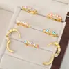 Pendientes de Ojo Maligno Chapados en Oro Real de Cobre de 18 Quilates con Micro Circonio Moda Venta Caliente Sentido de Diseño de Nicho Especial Transfronterizo