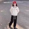 2026 primavera y otoño nuevos estilos pantalones casuales lisos simples para niñas conjunto versátil de dos piezas con top de solapa a cuadros y retazos