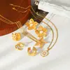 Pendientes de flor de nicho de acero de titanio estilo ins de moda europea y americana, collar versátil de pentagrama de acero inoxidable chapado en oro de 18 quilates para mujer