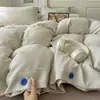 2026 Novo Conjunto de Roupa de Cama de Algodão Lavado Conjunto de Quatro Peças Estilo Muji Listrado Botão Tecido Colorido Jacquard Casa Quarto Conjunto de Quatro Peças
