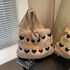 Bolsa tejida de gran capacidad calada, bolsa de compras para mujer, bolsa de punto, bolso de nuevo estilo con forma de corazón, bolsa de playa, bolso para mujer