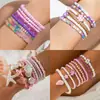 Pulsera Elástica de Cuentas de Arroz Bohemio Multicapa Transfronteriza Europea y Americana Set de Pulseras para Mujer de Color Contrastante de Nicho